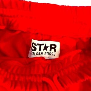 Amazing, red golden goose track pants